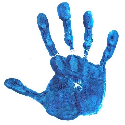 Blue handprint symbolizing awareness, protection, and advocacy against human trafficking in healthcare settings